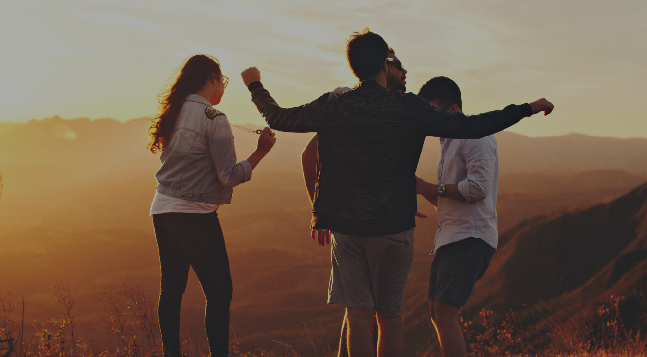 Four friends at sunset